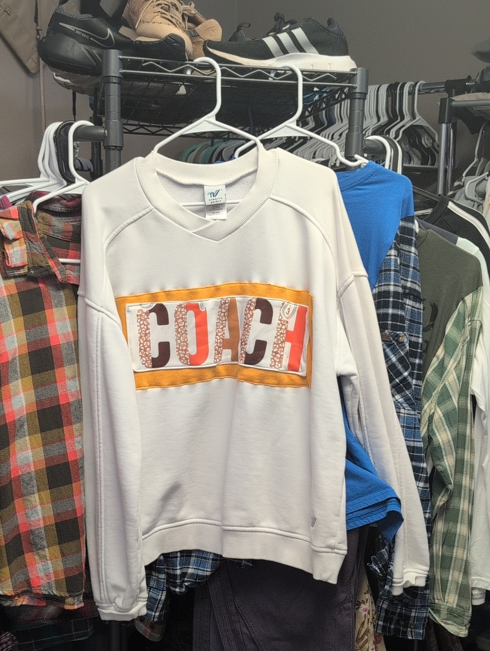 Coach Cream Pullover Sweatshirt with Orange Graphic